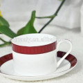 colored ceramic cup and saucer